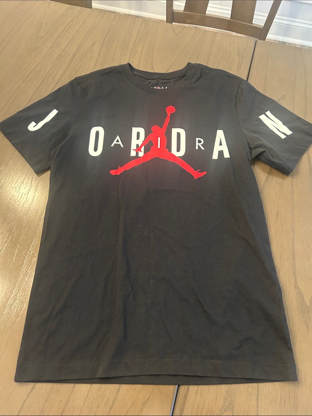 Jordan Black Short-Sleeve Tee with Red Jumpman and White Lettering